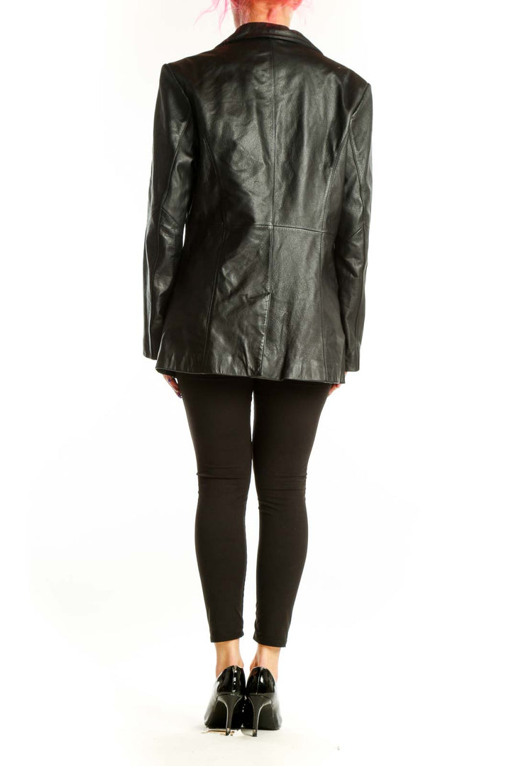 Back view of black leather blazer showing tailored silhouette and structured construction