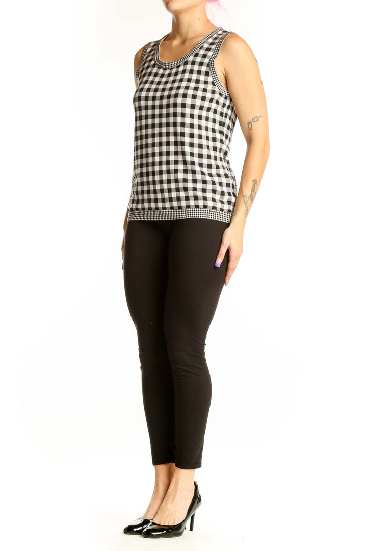 Black and white gingham check sleeveless tank top with crew neckline and gingham trim detail, front view
