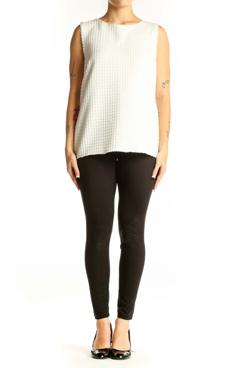 Front view of white textured sleeveless blouse from Banana Republic