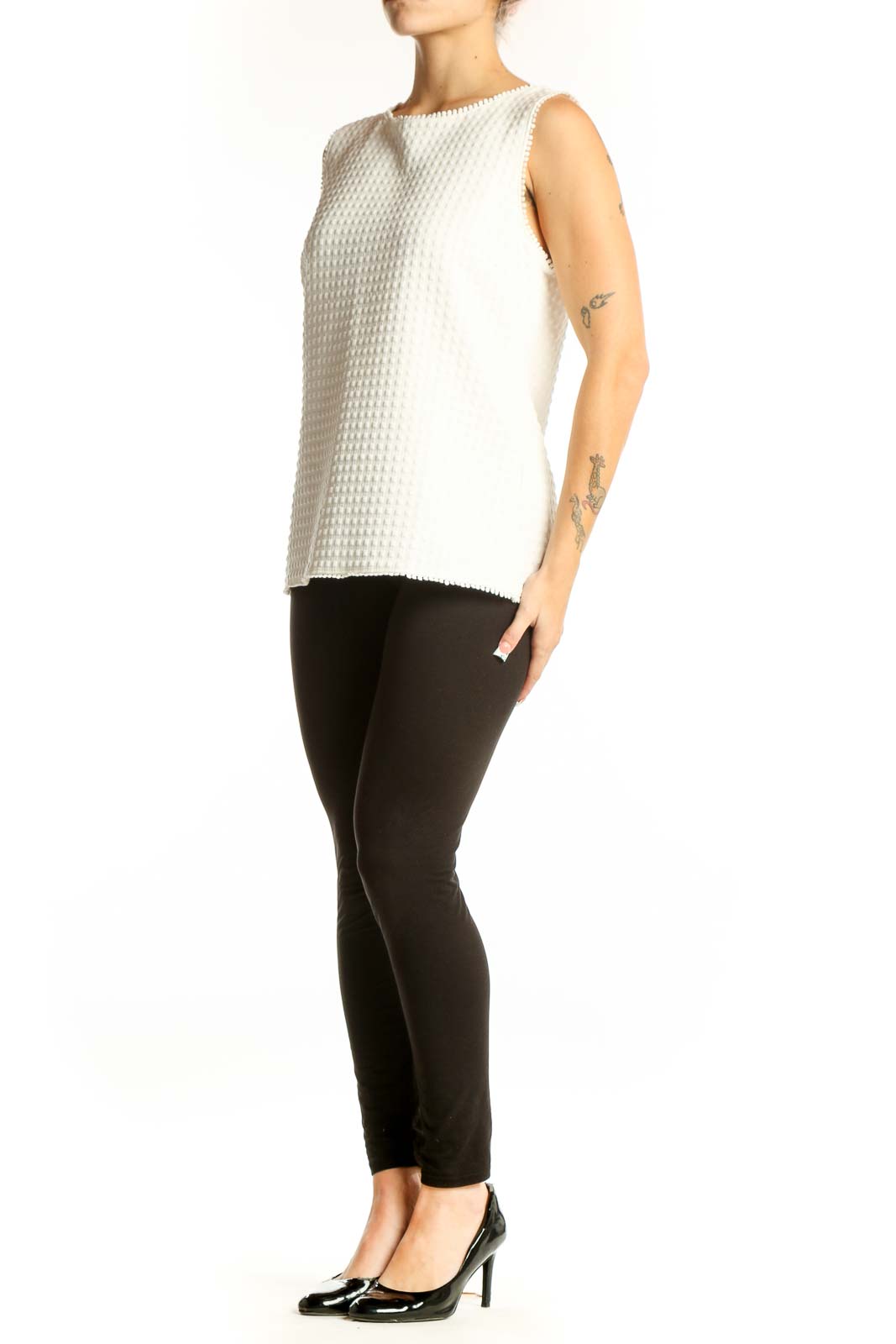 Front view of white textured sleeveless blouse from Banana Republic