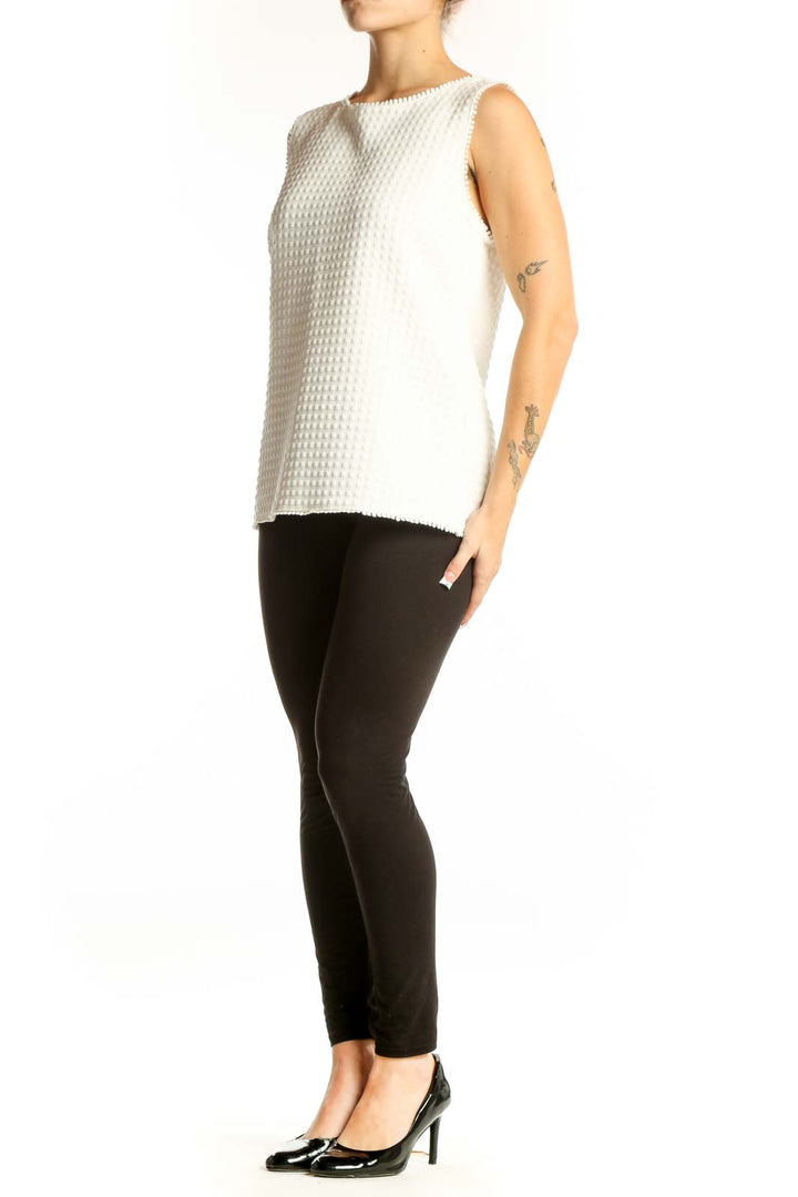 Front view of white textured sleeveless blouse from Banana Republic