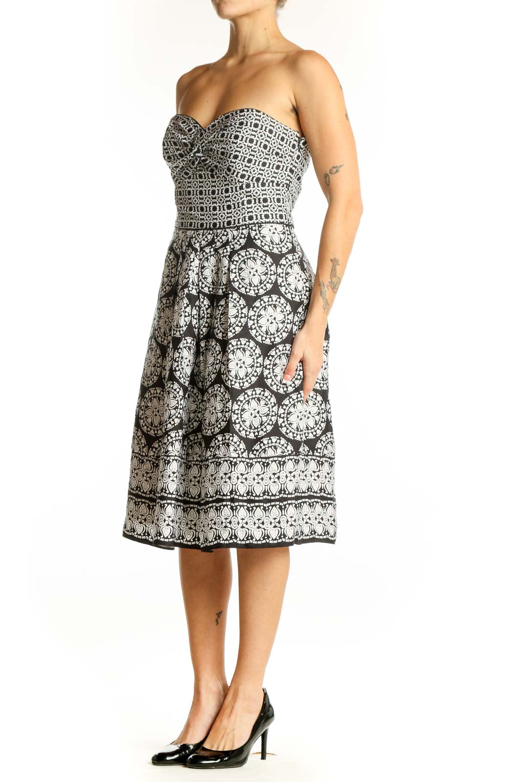 Front view of Black and White Geometric Strapless Dress from White House Black Market