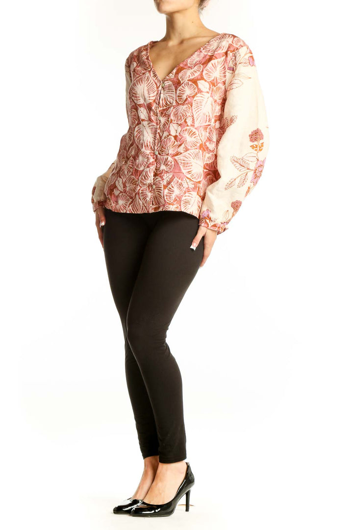 Front view of Tahari pink floral linen blouse with V-neckline