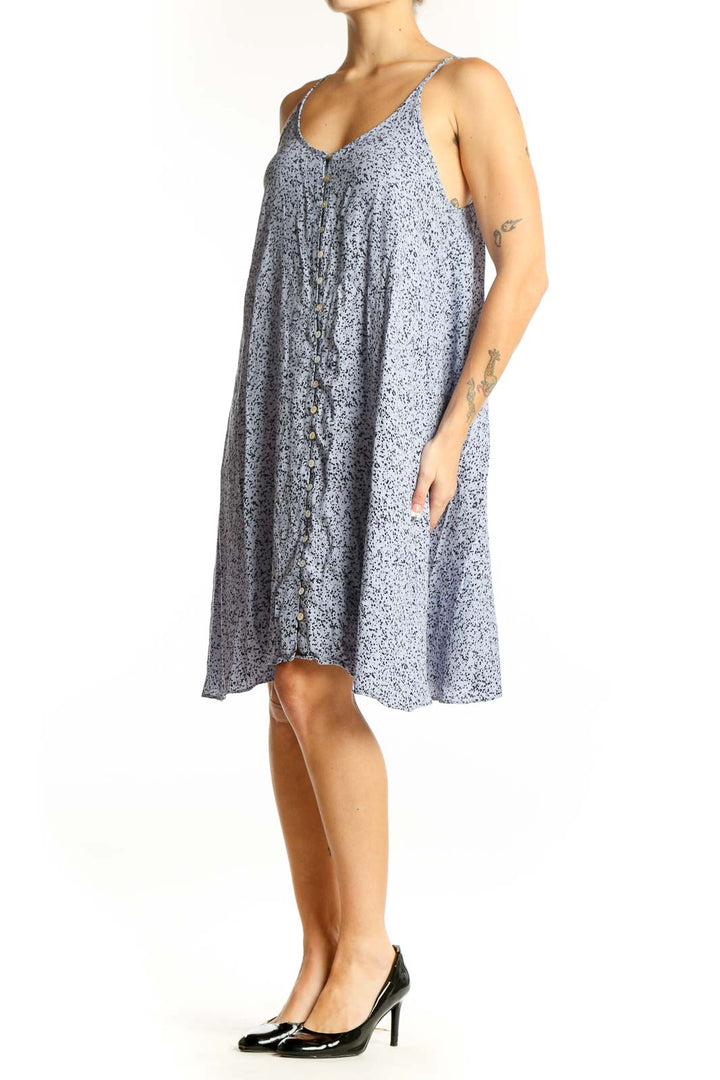 Front view of blue speckled spaghetti strap sundress by Stockholm Atelier