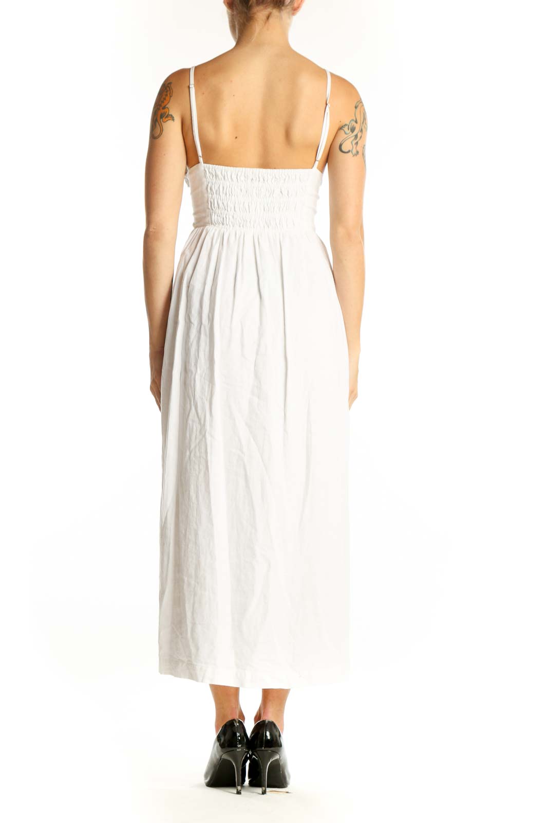 Side view of Madewell white linen blend midi dress showing flowy skirt
