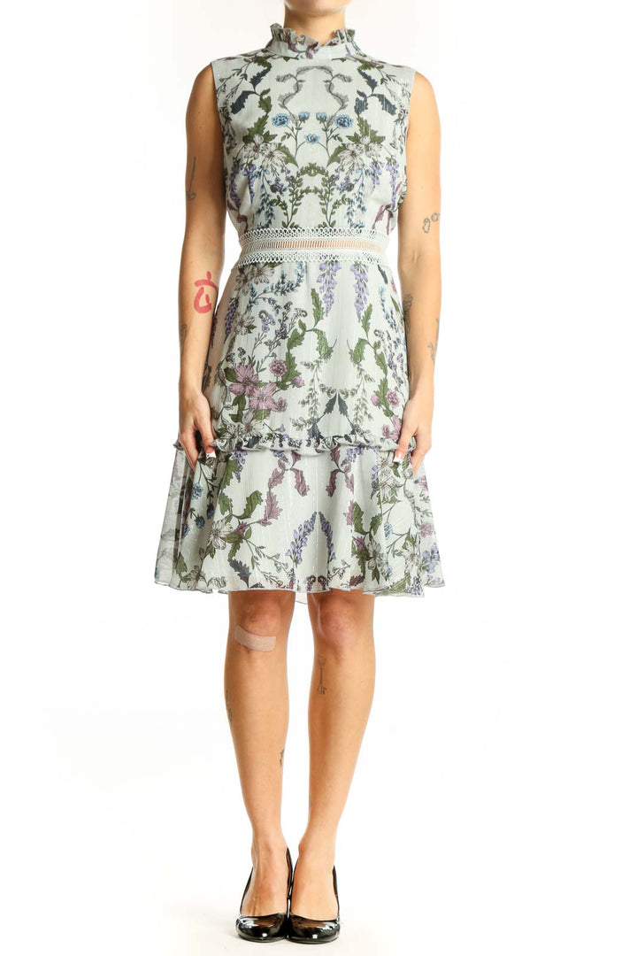 Front view of Donna Morgan mint floral sleeveless cocktail dress with high neckline