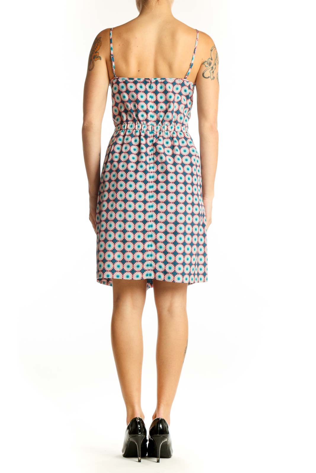 Side view of J.Crew blue floral geometric print sundress showing fit-and-flare silhouette