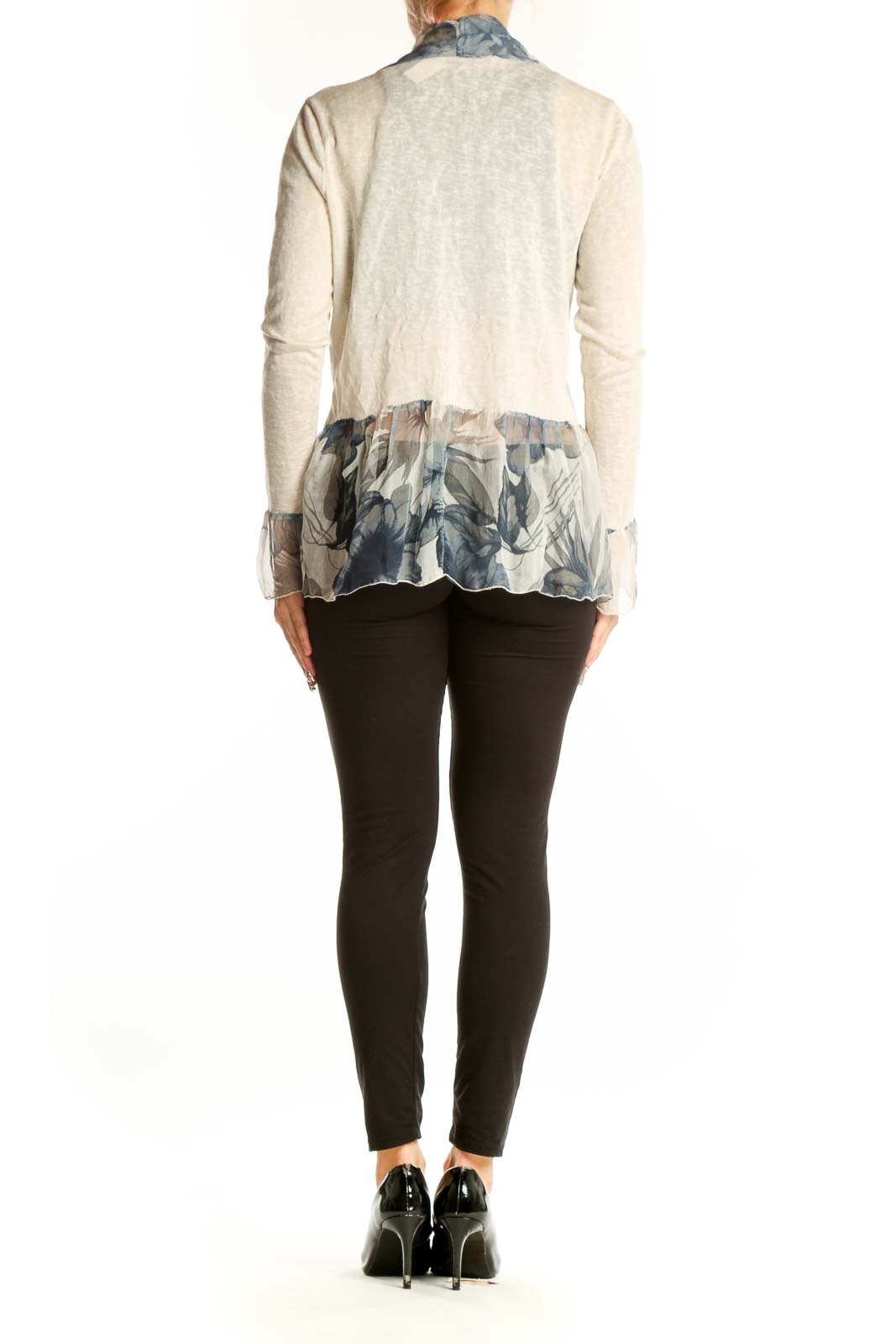 Side view of Elena Baldi beige knit cardigan showing floral print and silhouette