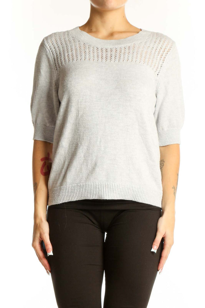 Front view of light gray Banana Republic short-sleeve sweater with open-knit yoke