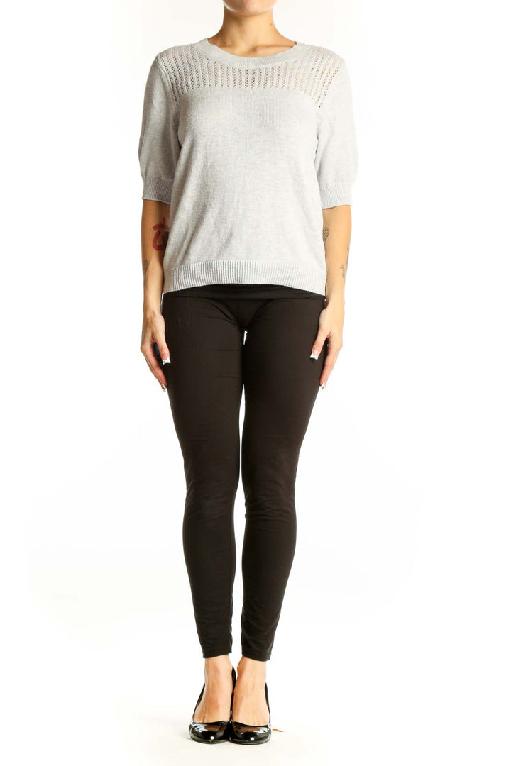 Front view of light gray Banana Republic short-sleeve sweater with open-knit yoke