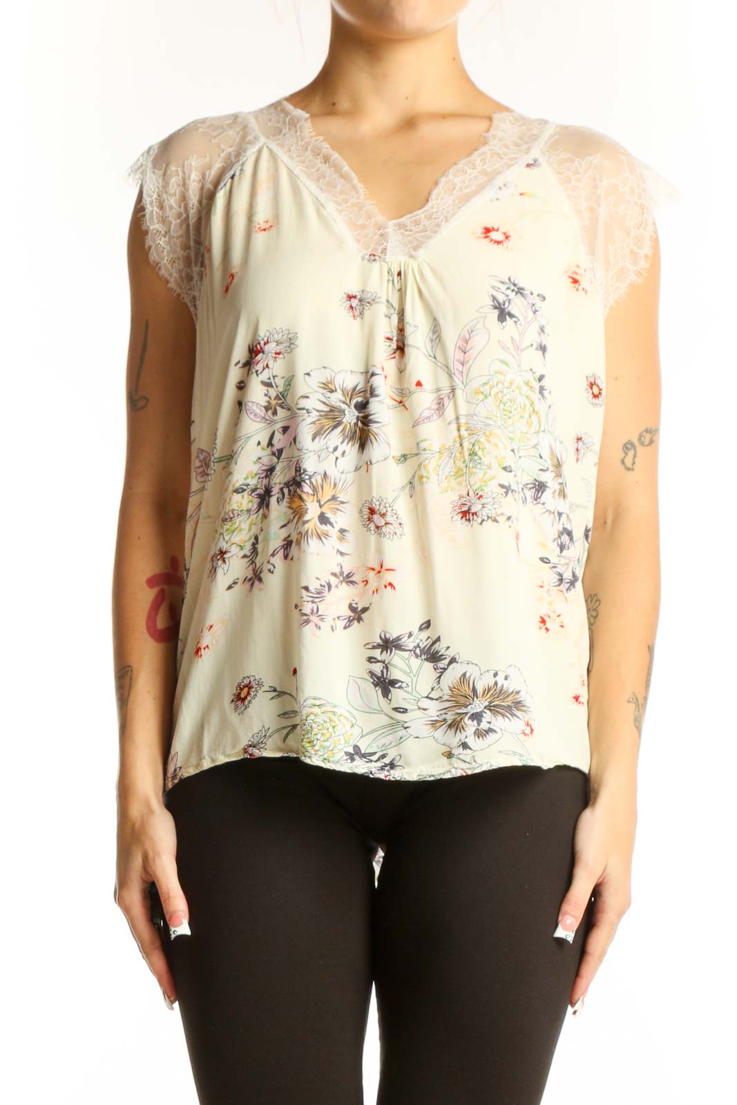 Front view of C+D+M cream floral sleeveless top with lace trim