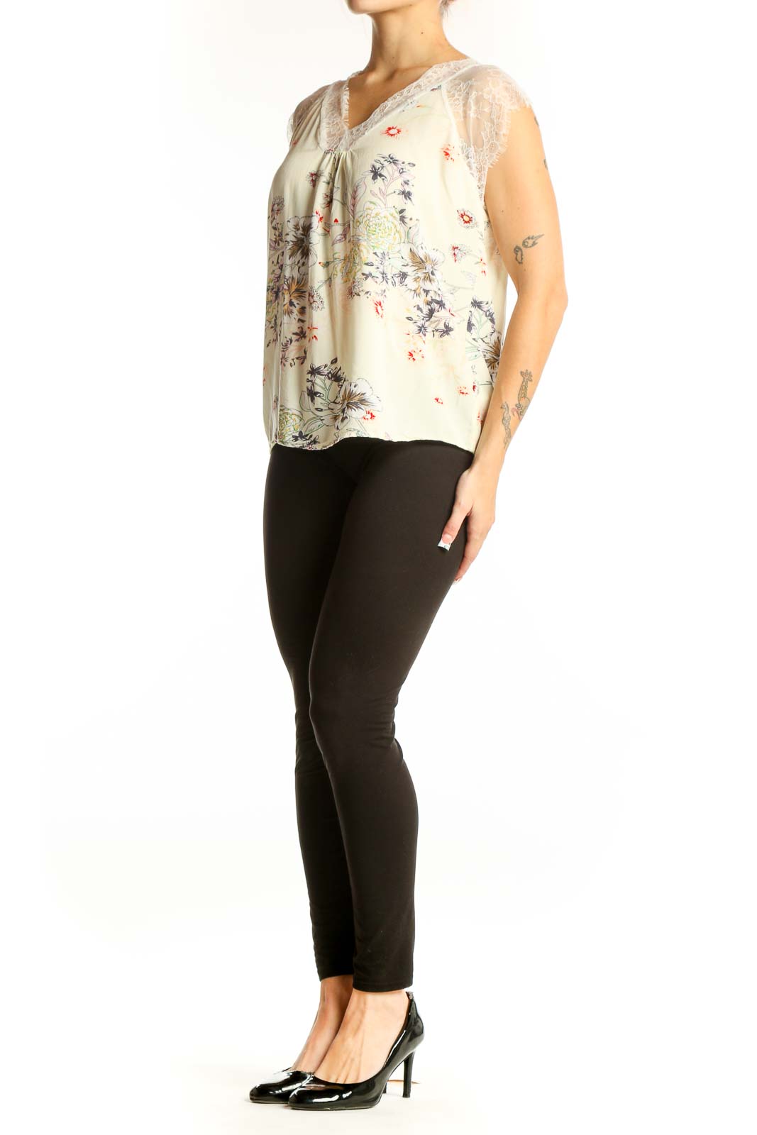 Front view of C+D+M cream floral sleeveless top with lace trim
