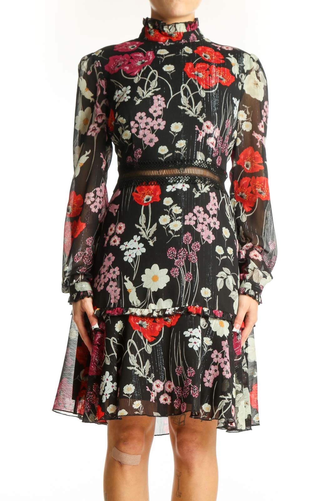 Front view of Donna Morgan black floral print chiffon cocktail dress with high neck and long sleeves