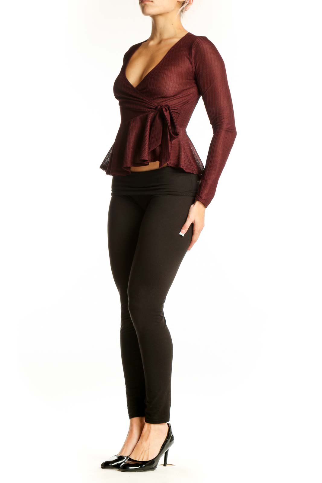 Front view of burgundy wrap peplum top with V-neckline and side tie