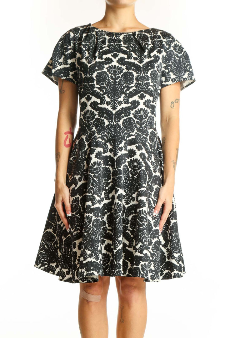 Front view of Closet London black and white floral print fit and flare dress