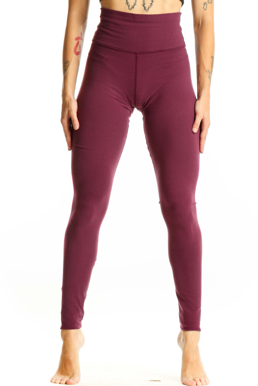 Front view of burgundy Lululemon high-waisted athletic leggings