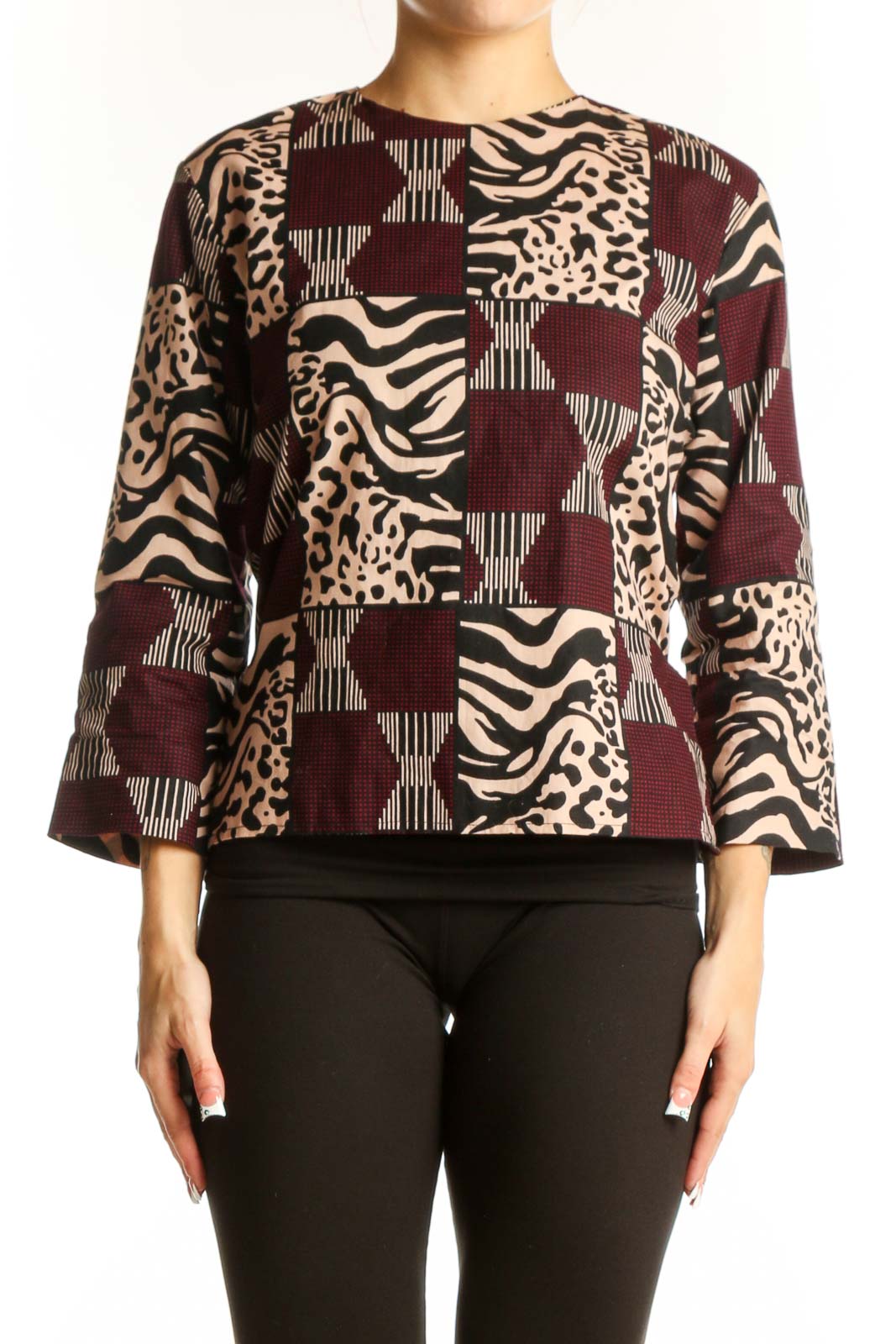 Front view of Heritage Clothing burgundy animal print patchwork top