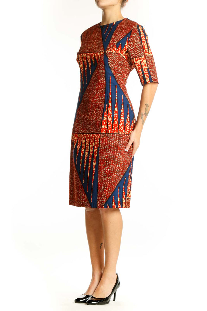 Front view of SilkRoll orange and navy geometric print midi dress
