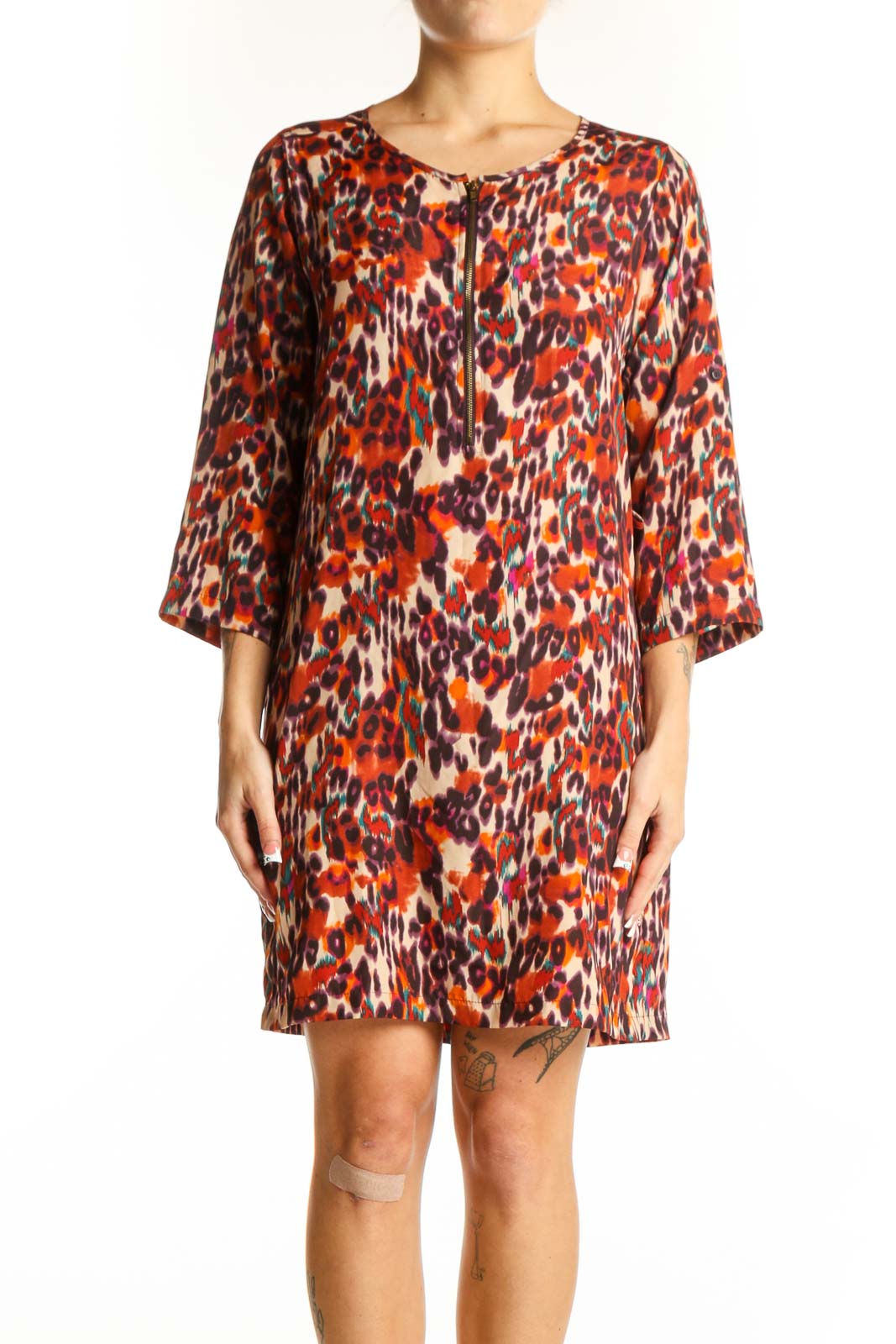 Front view of orange leopard print shift dress by bar III