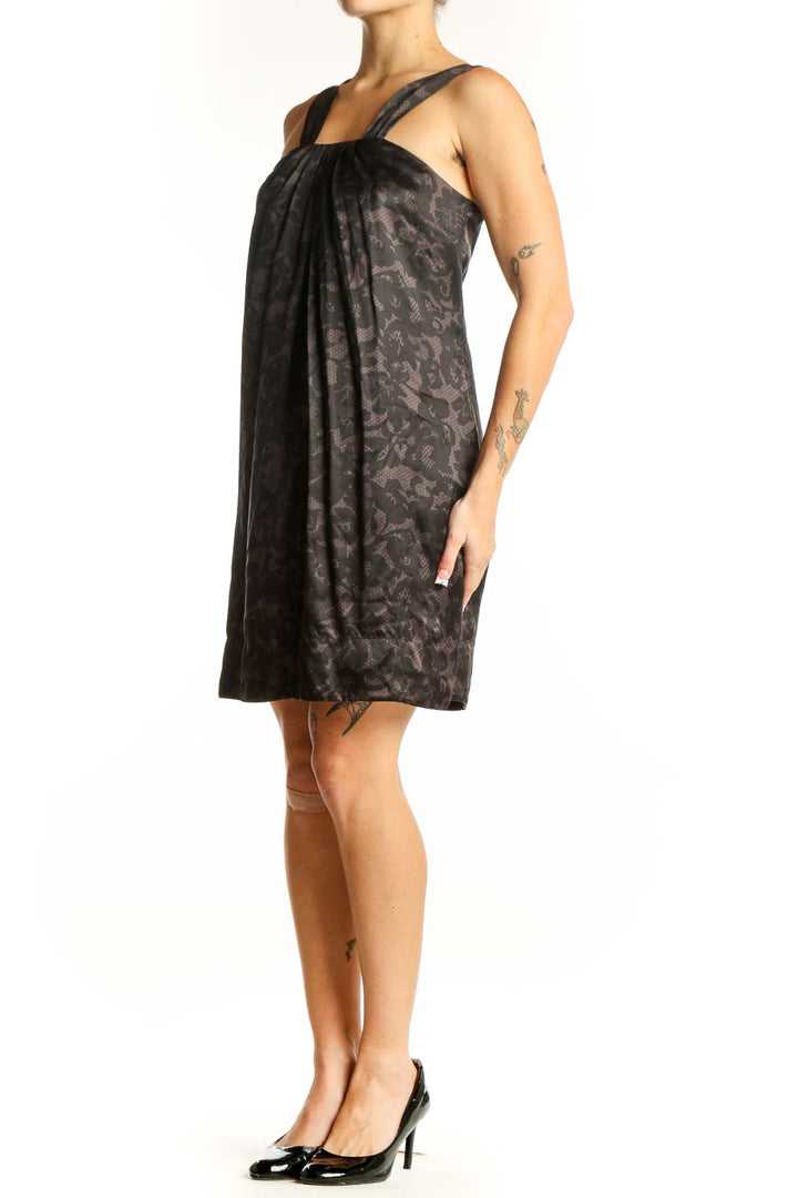 Front view of Banana Republic black floral cocktail dress with gathered neckline