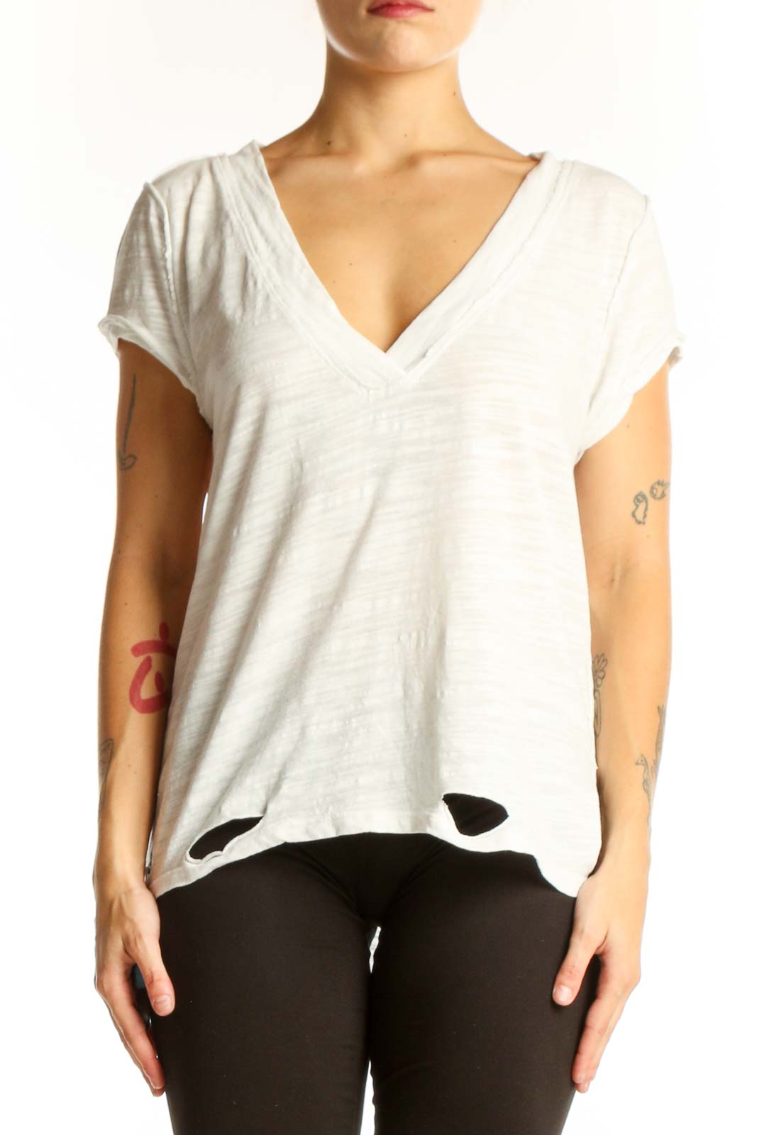 Front view of WE THE FREE white V-neck distressed top