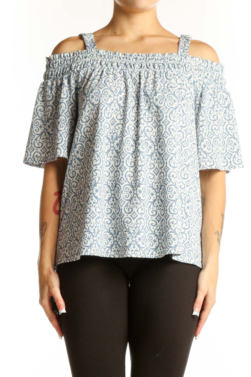 Front view of Melloday blue and white floral off-shoulder top with adjustable straps