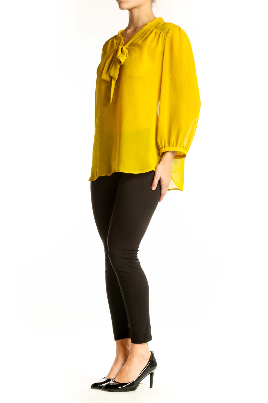 Front view of yellow sheer tie-neck blouse from LOFT