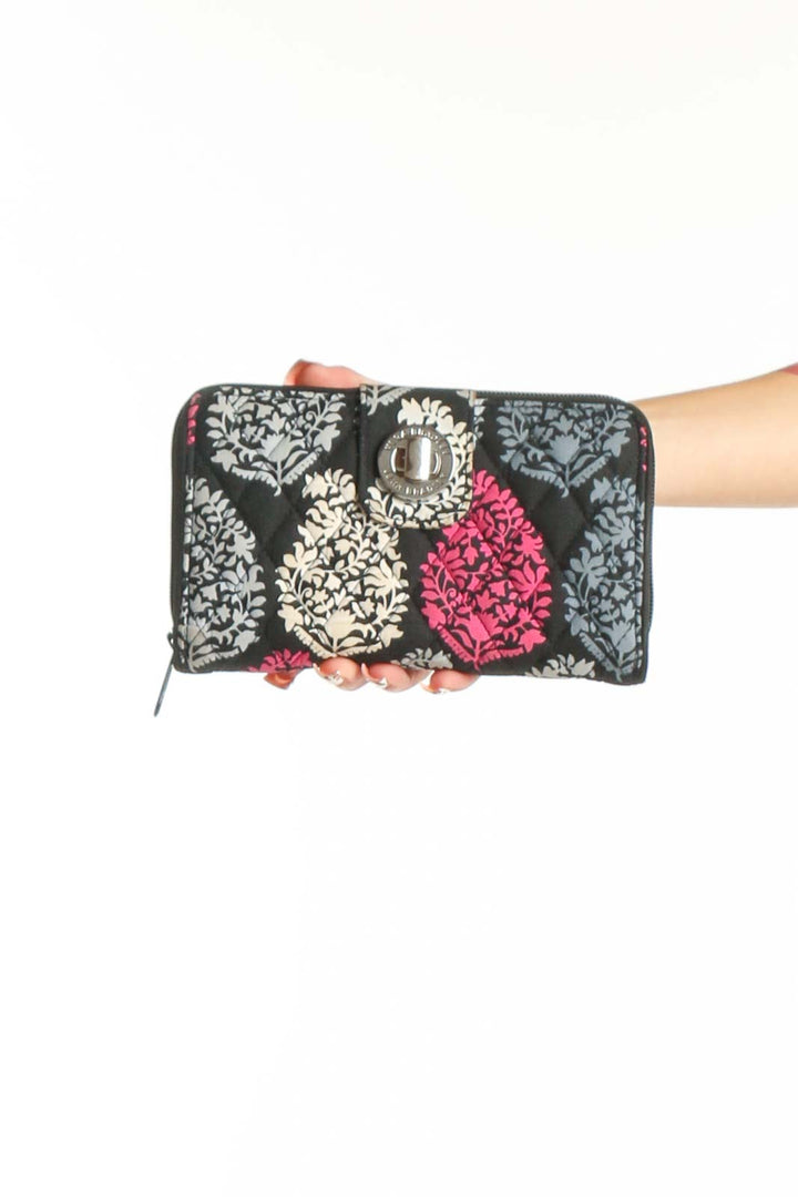 Front view of Vera Bradley black floral print zip-around wallet with silver turn-lock closure