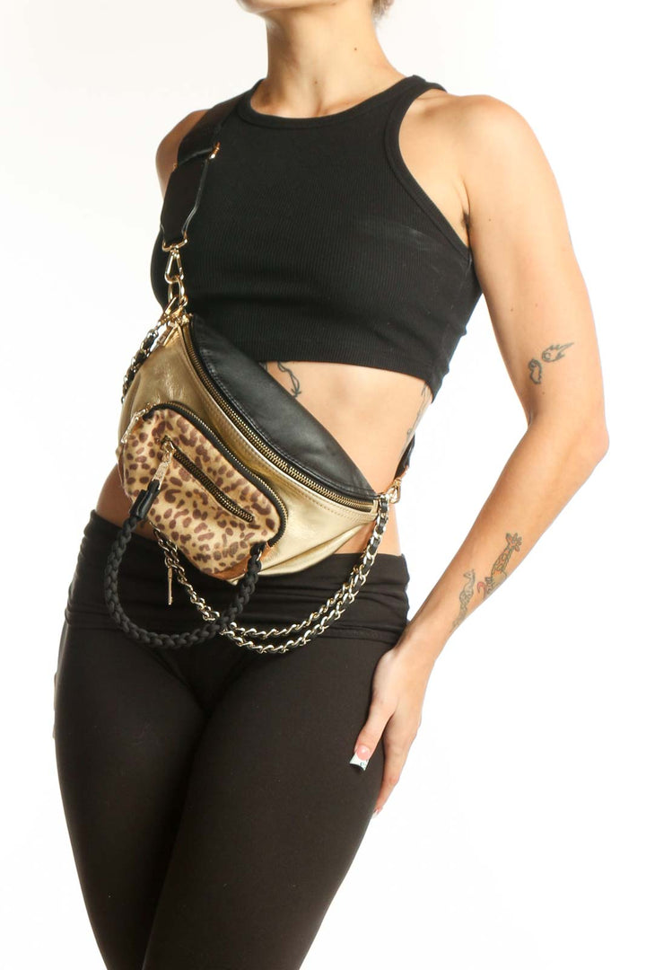 Front view of Steve Madden gold and leopard print crossbody bag with chain strap