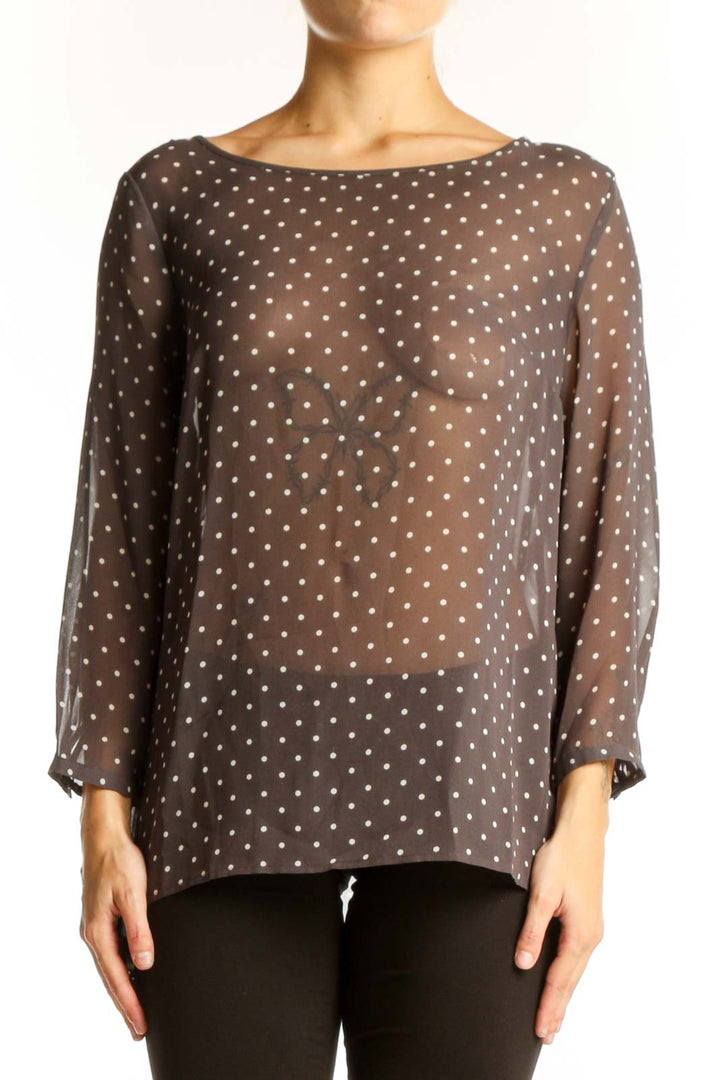 Front view of LOFT brown polka dot sheer blouse