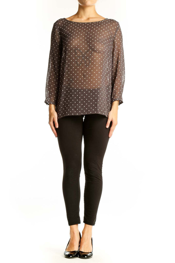Front view of LOFT brown polka dot sheer blouse