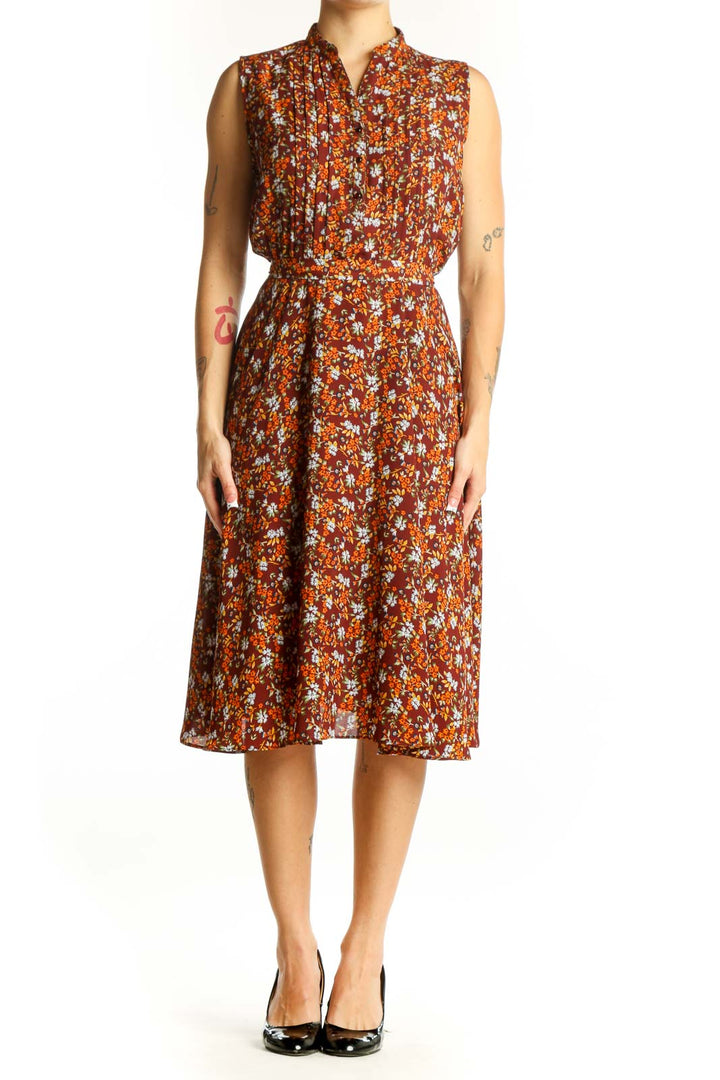 Front view of Nanette Lepore orange floral sleeveless midi dress