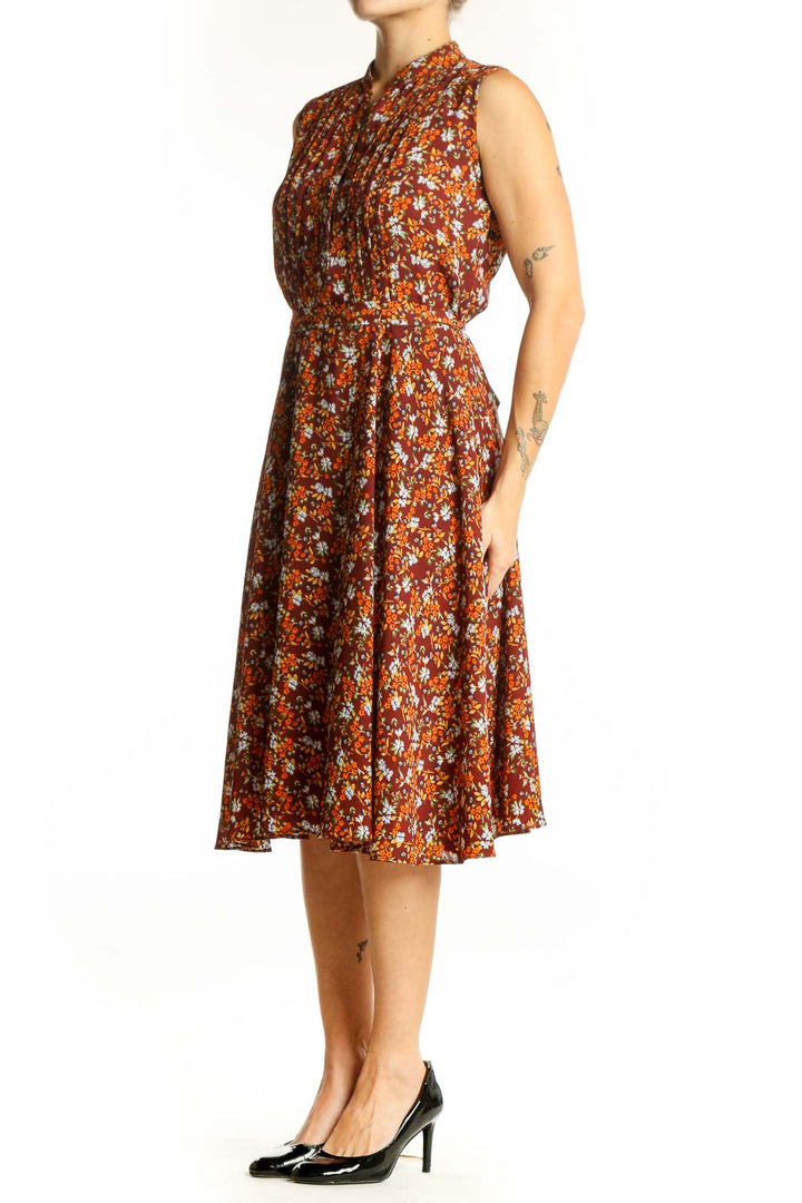 Front view of Nanette Lepore orange floral sleeveless midi dress