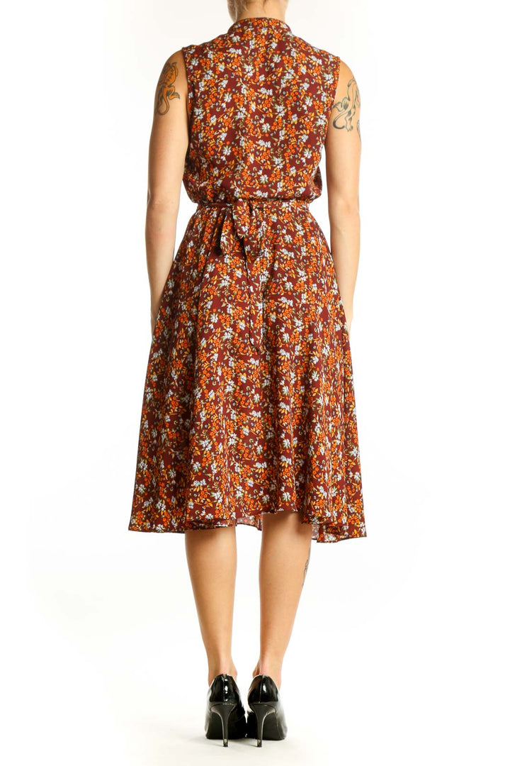 Side view of Nanette Lepore orange floral sleeveless midi dress