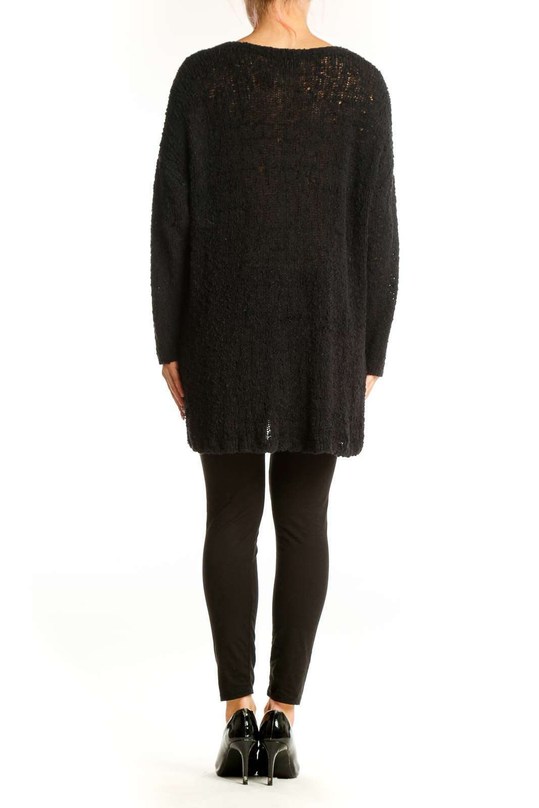 Side view of model wearing black oversized V-neck knit sweater from Lucky Brand