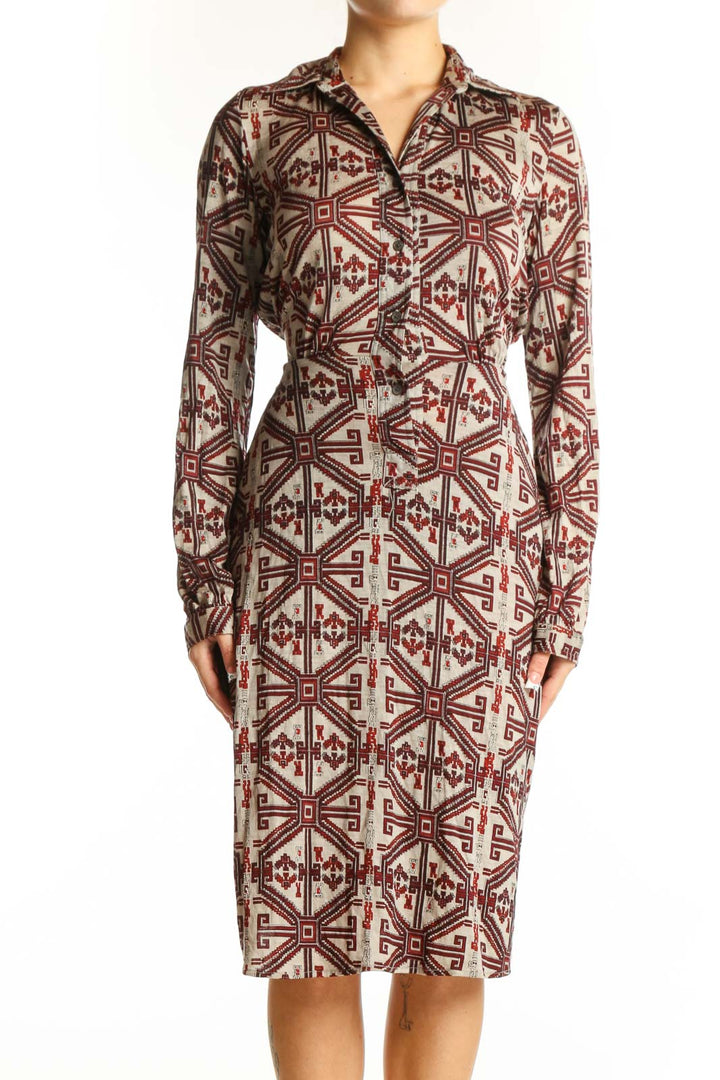 Front view of Nieves Lavi burgundy geometric print wool dress with button-down front