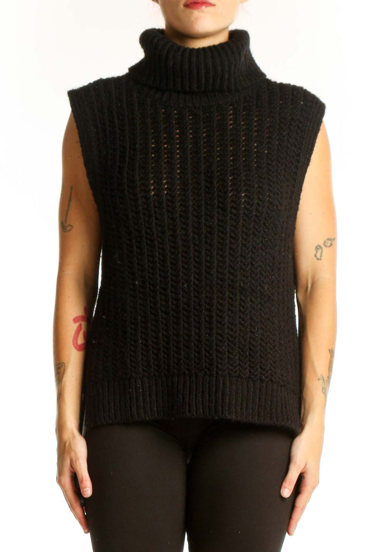 Front view of black sleeveless turtleneck sweater by SilkRoll