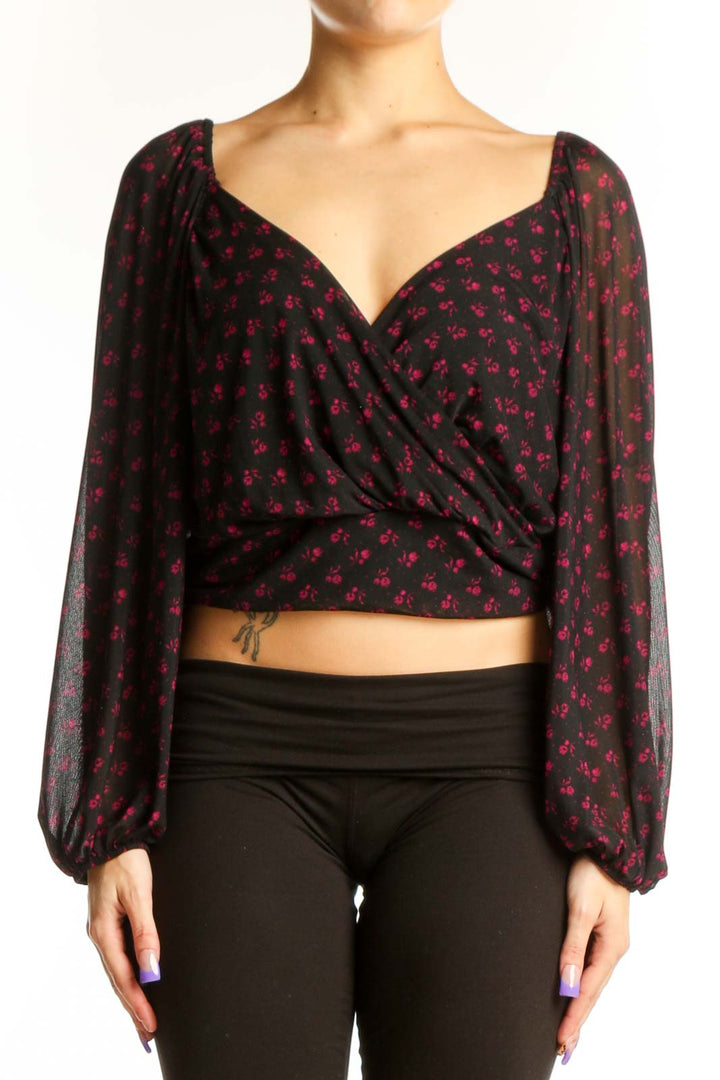 Free People burgundy floral wrap crop top with sweetheart neckline and voluminous long sleeves, front view