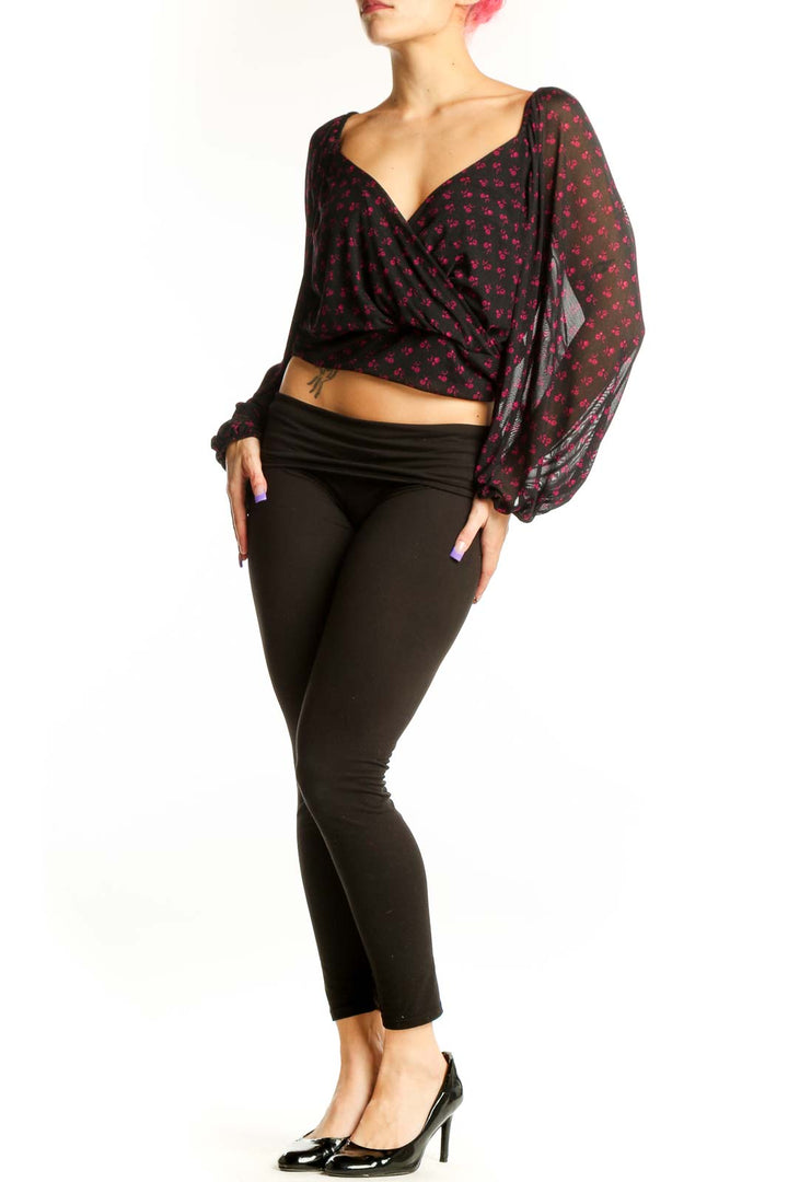 Free People burgundy floral wrap crop top with sweetheart neckline and voluminous long sleeves, front view