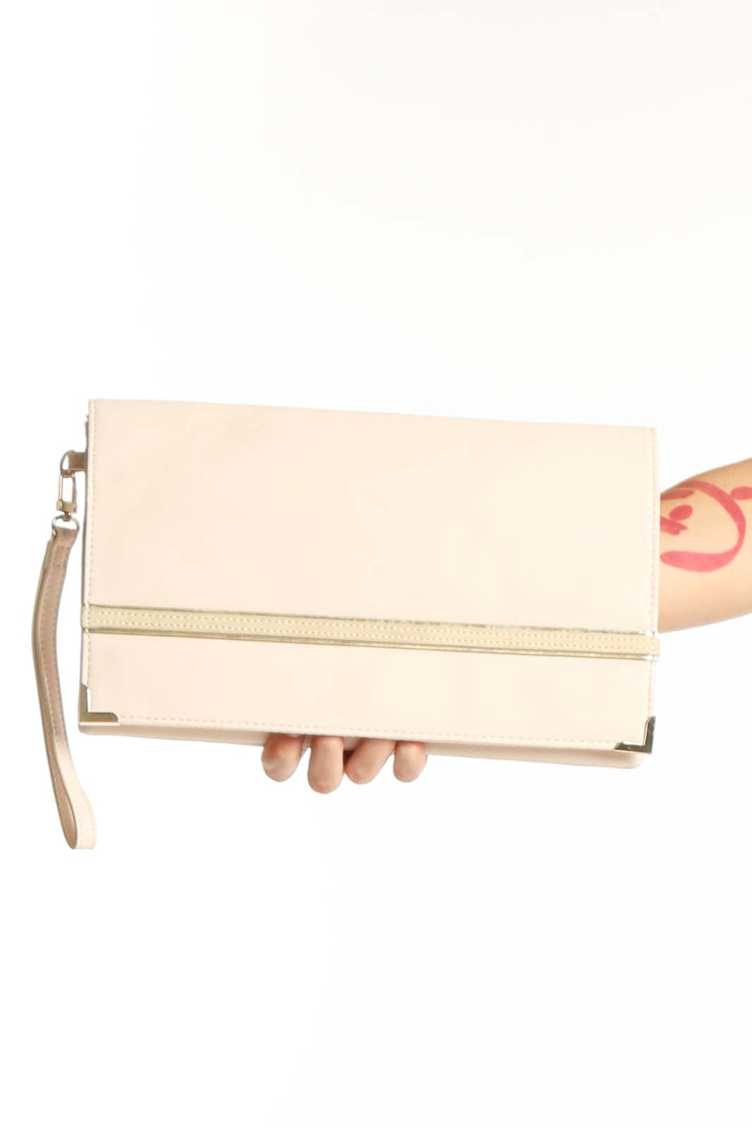Cream fold-over clutch with gold metallic stripe detail and wrist strap by White House Black Market