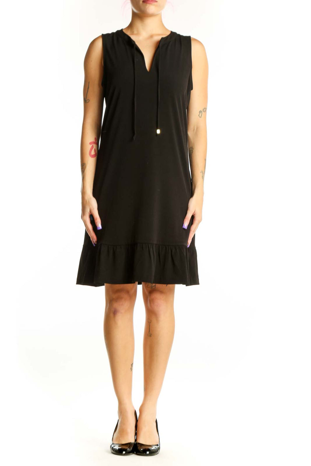 Black sleeveless shift dress with V-neckline and ruffle hem, front view
