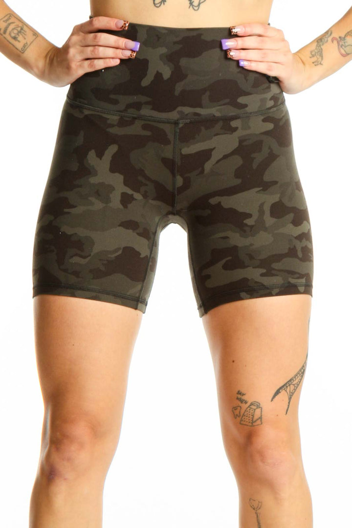 Front view of olive camo Lululemon bike shorts XS with high-waisted fitted design and camouflage pattern