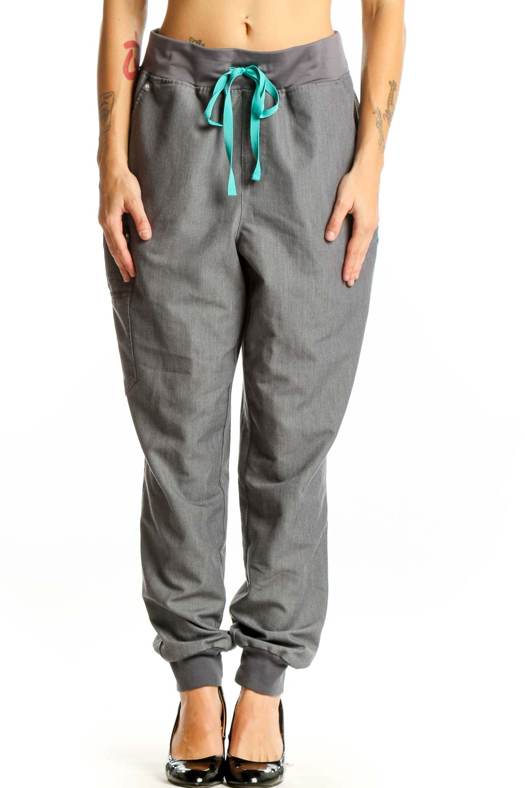 Front view of gray FIGS jogger pants with teal drawstring