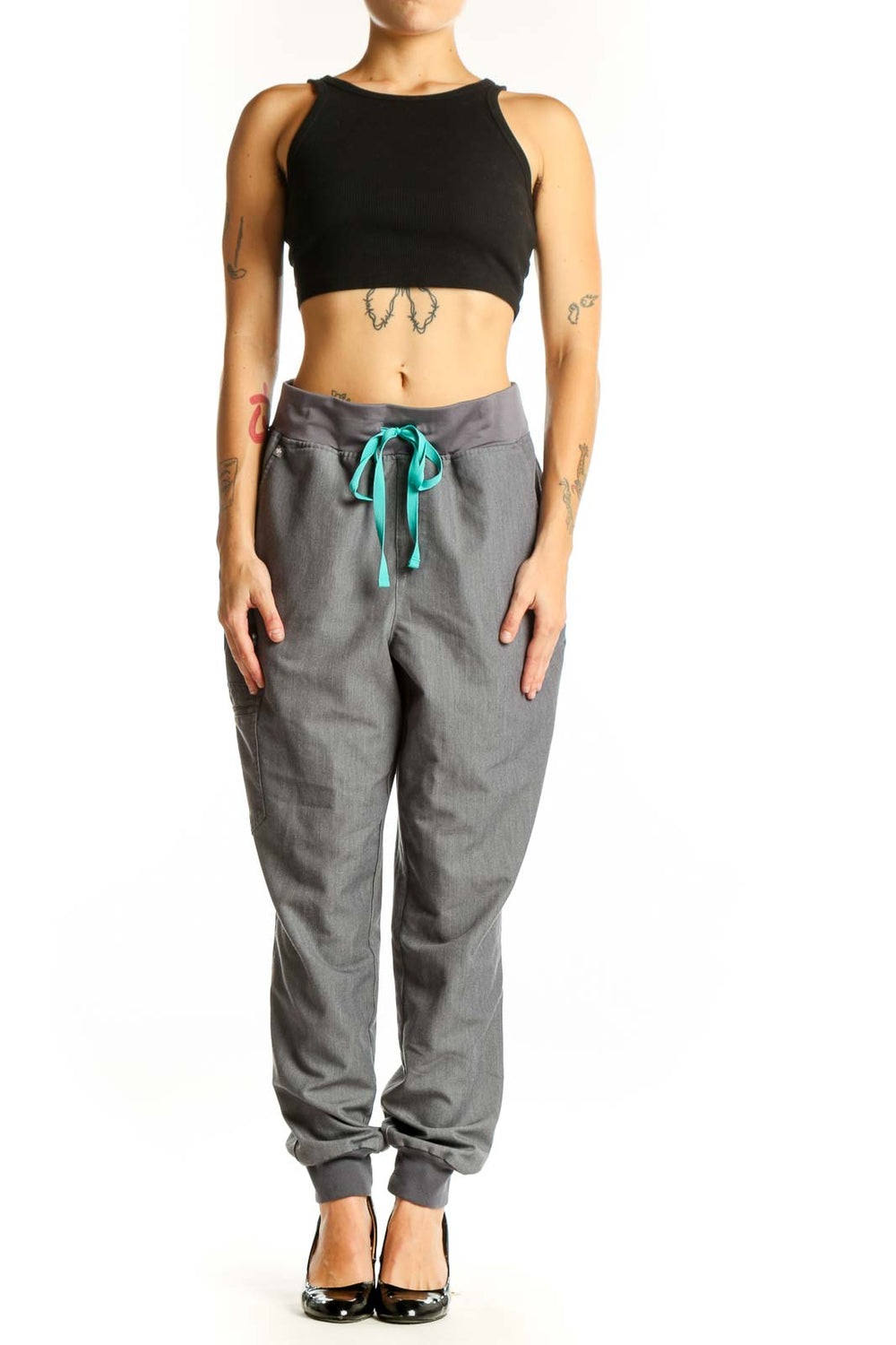 Front view of gray FIGS jogger pants with teal drawstring