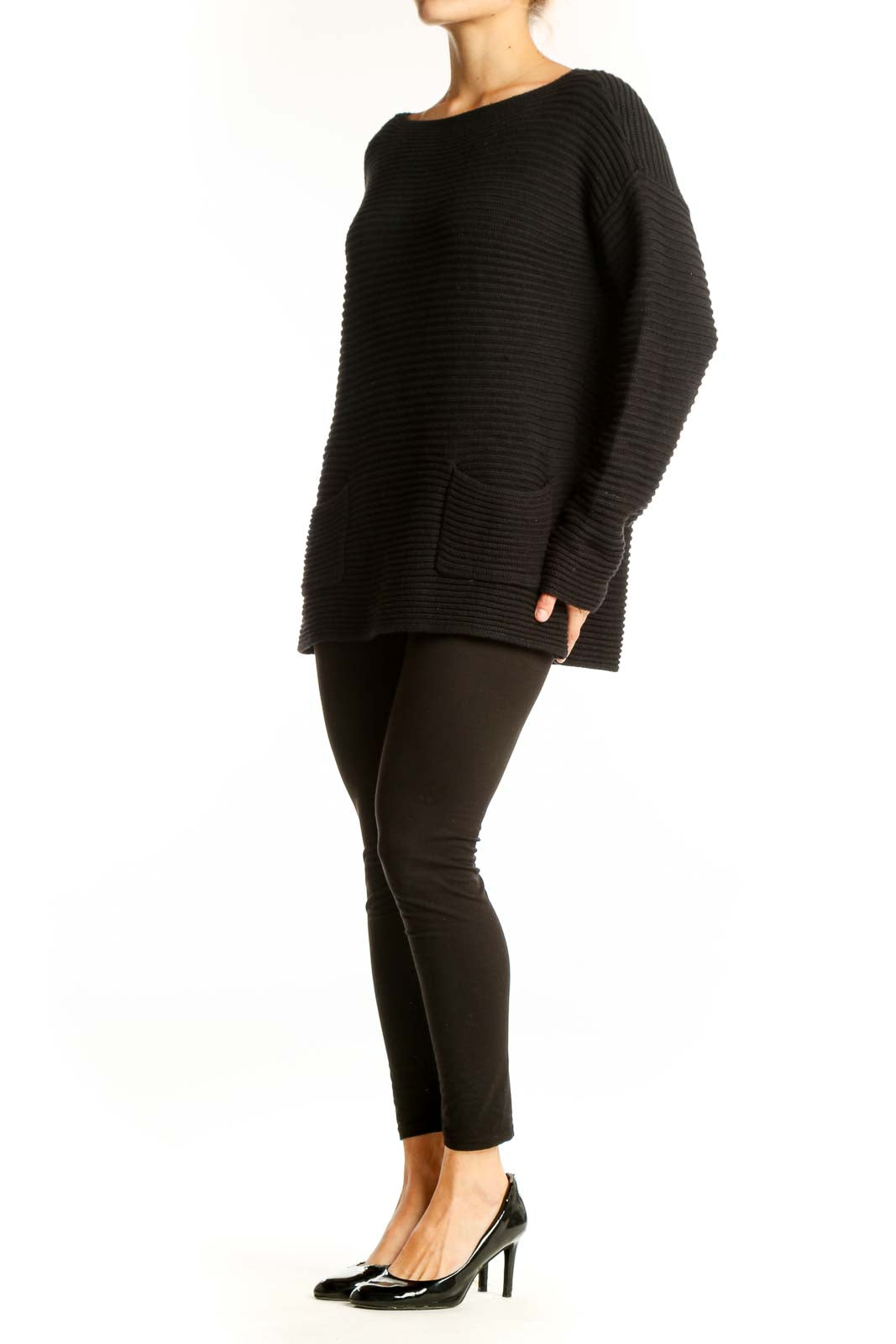 Front view of Vince Camuto black ribbed knit sweater with boat neck and front pockets