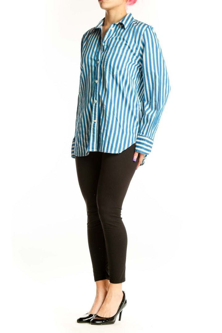 Blue and white striped cotton button-down shirt by J.Crew, front view on model