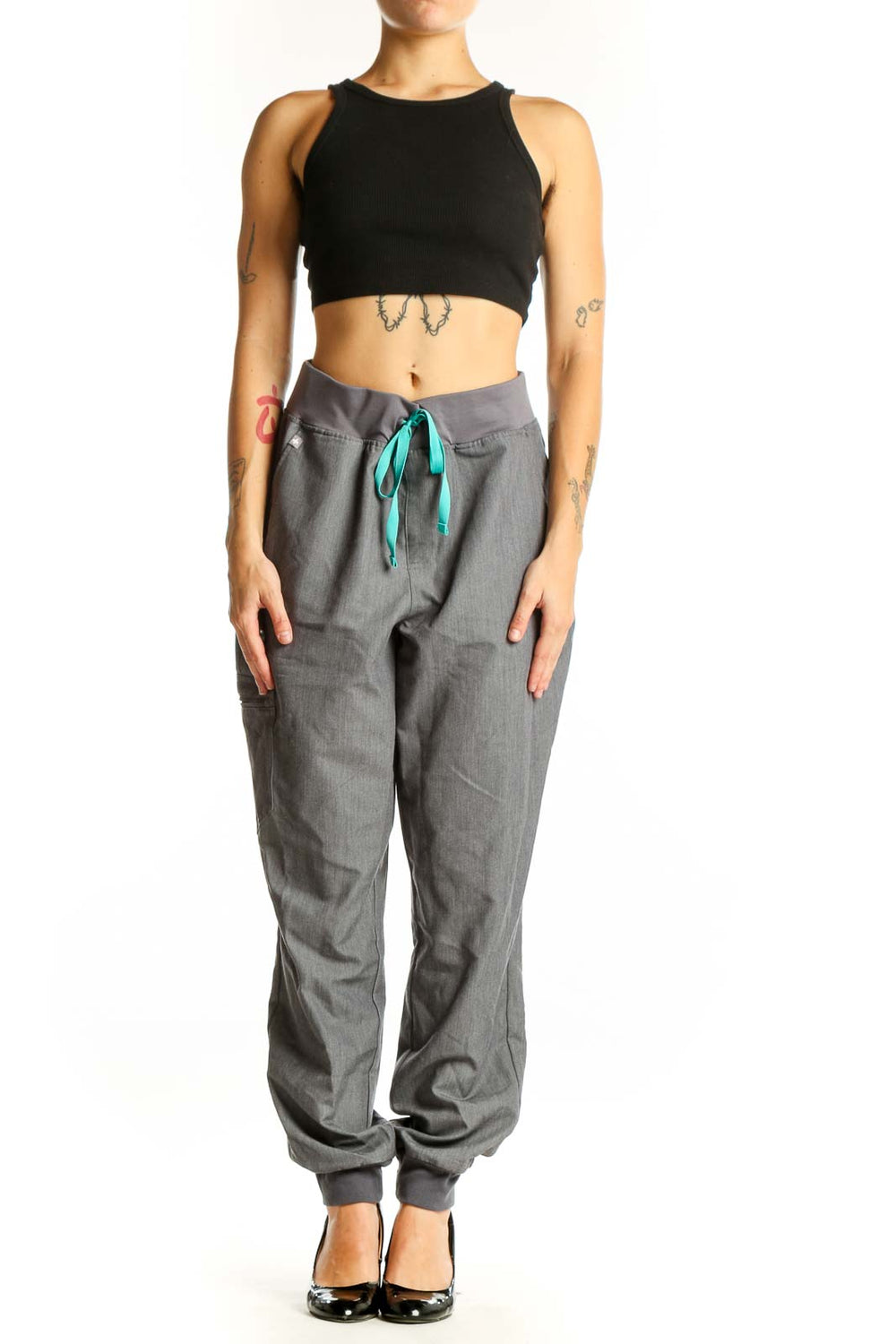 Front view of gray FIGS jogger pants with teal drawstring