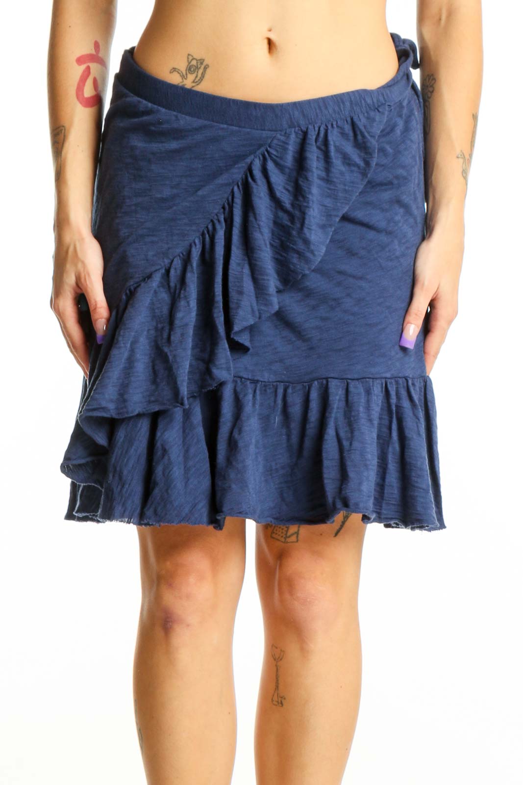 Navy ruffled cotton mini skirt with asymmetrical wrap-style front and tiered ruffle detail