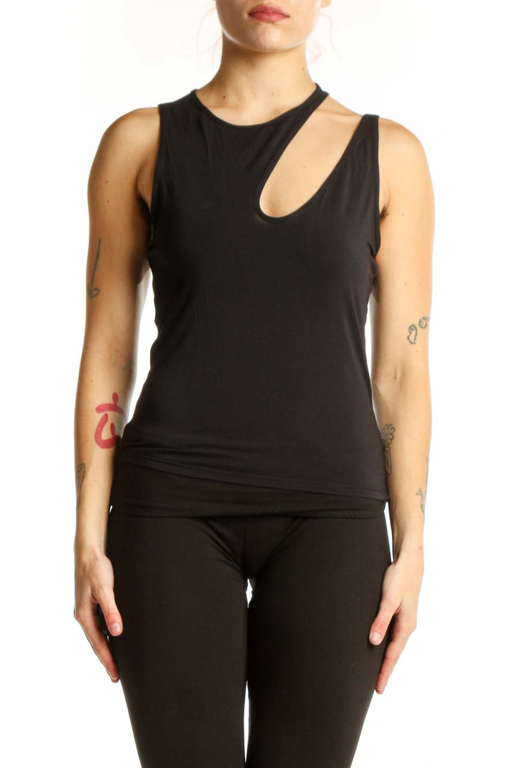 Black cutout tank top with asymmetrical neckline detail, front view on model