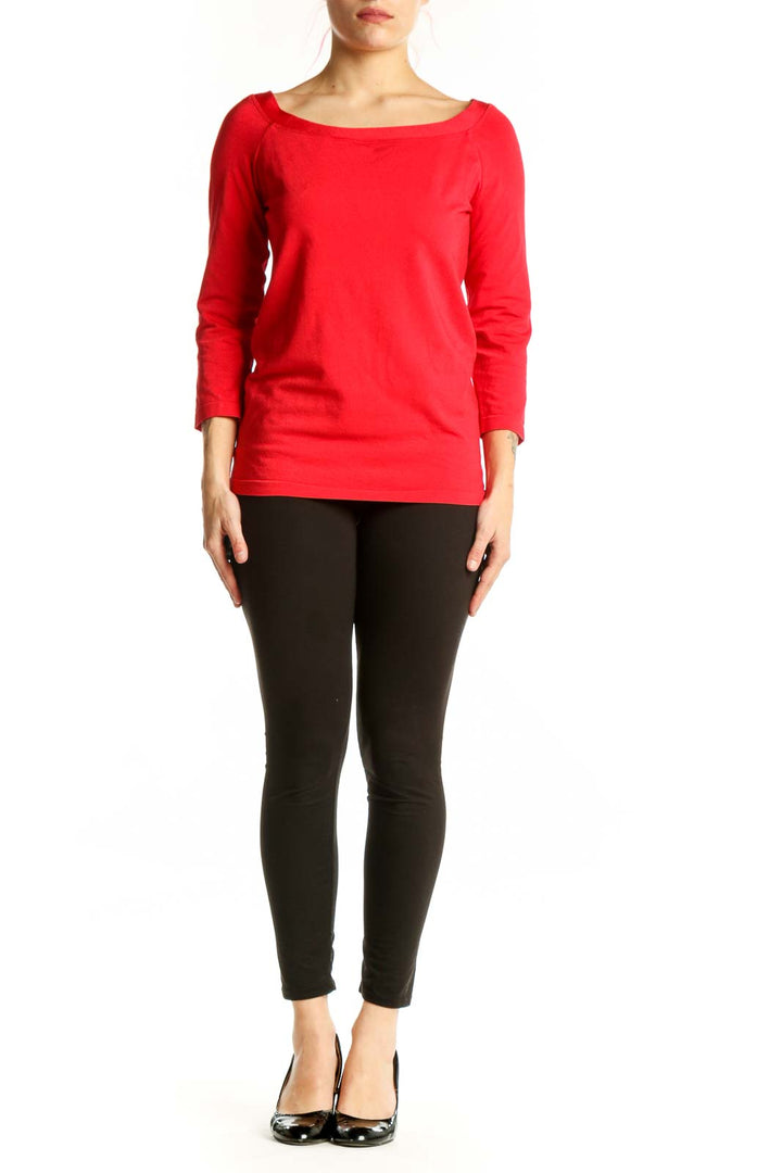 Red long sleeve cotton top with crew neckline, front view on model